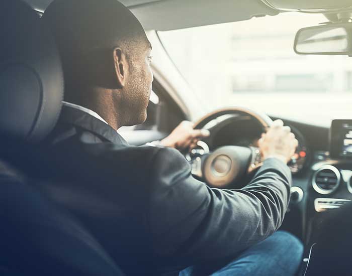 A man driving the car